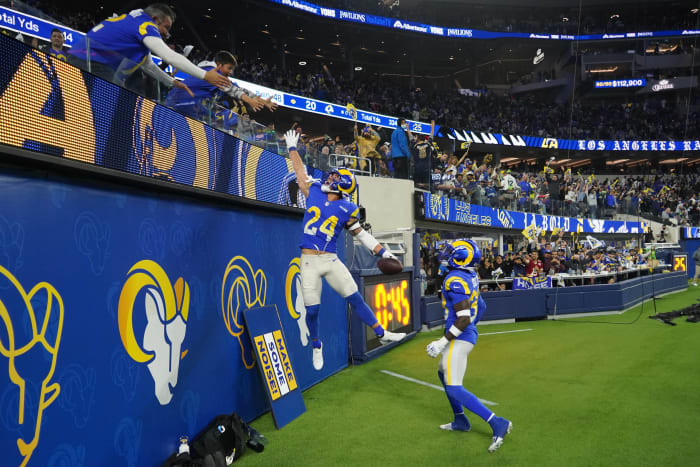 Dec 21, 2021; Inglewood, California, USA; Los Angeles Rams free safety Taylor Rapp (24) celebrates with fans after intercepting a pass against the Seattle Seahawks in the second half at SoFi Stadium. The Rams defeated the Seahawks 20-10. Mandatory Credit: Kirby Lee-USA TODAY Sports